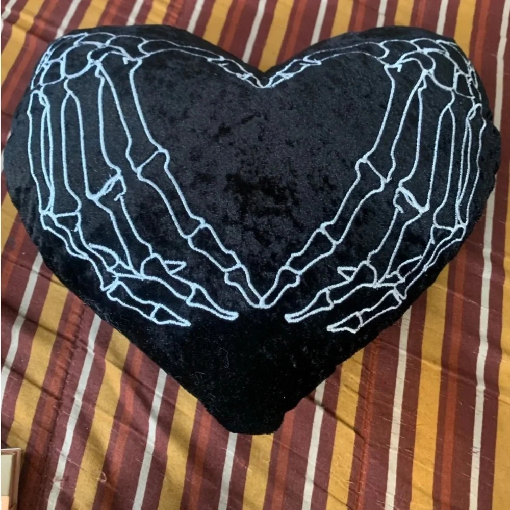 Black Heart Pillow with Skeleton Design